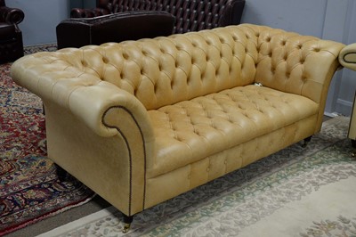 Lot 52 - A modern Chesterfield sofa in a sand-coloured tan