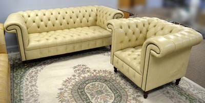 Lot 53 - A modern cream Chesterfield style sofa and a similar armchair