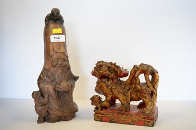 Lot 364 - A Chinese earthenware figure of Shou Lao, and another.