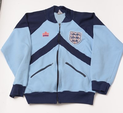 Lot 659 - England FIFA World Cup Mexico 1986 tracksuit tops and a signed football