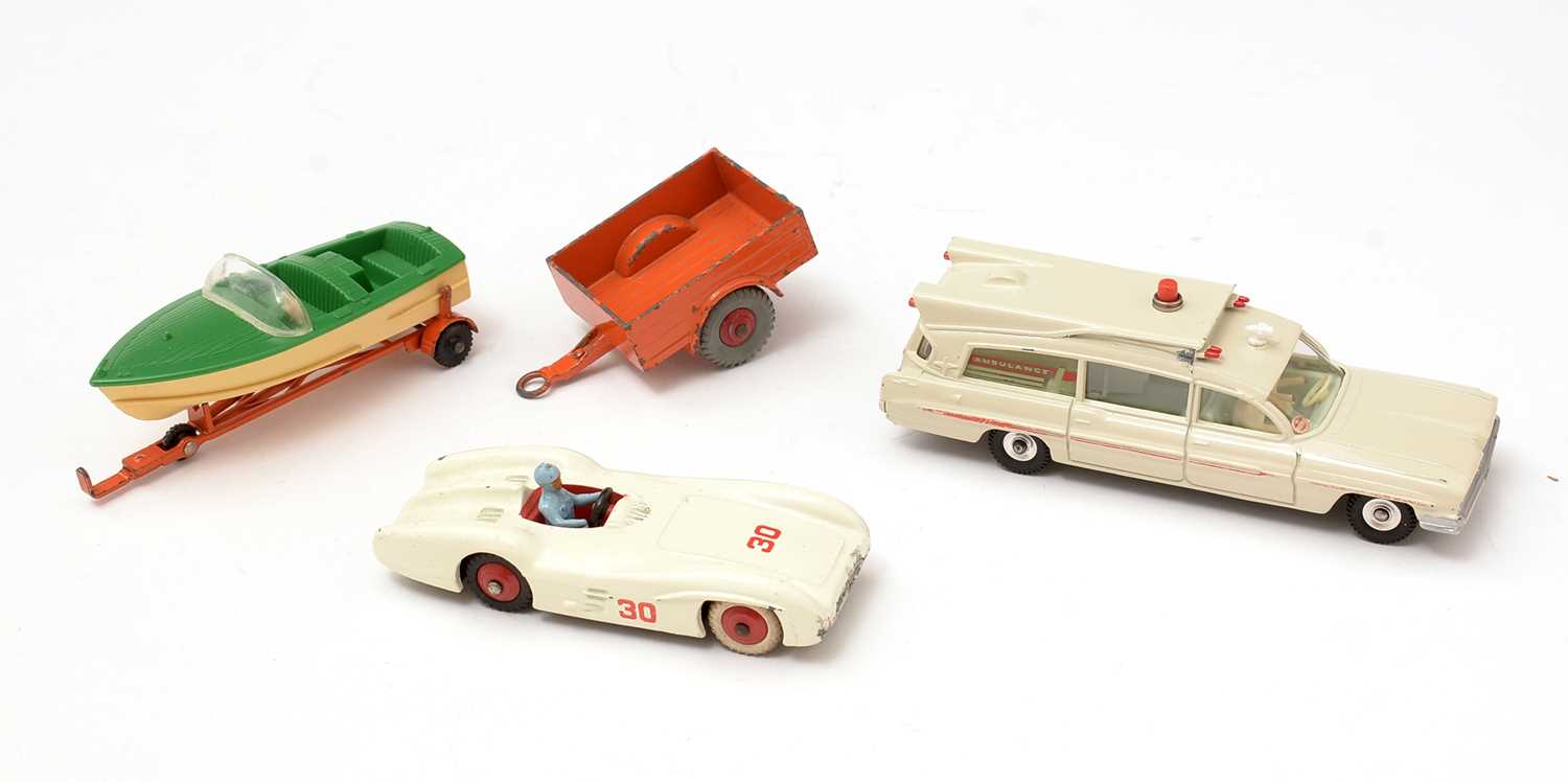 341 - Four boxed Dinky Toys.