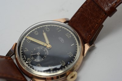 Lot 118 - A 1950s Trebex yellow-metal cased wristwatch