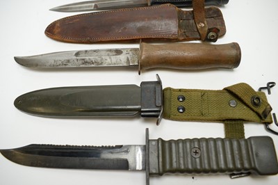 Lot 451 - Four fighting knives.