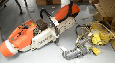 Lot 498 - A Stihl TS350 petrol saw; and a Bosch 4 1/2in. angle grinder and transformer.