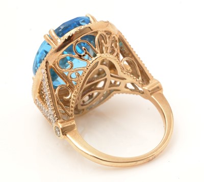 Lot 118 - A blue topaz and diamond ring