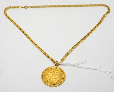 Lot 101 - A yellow-metal Chinese pendant on chain