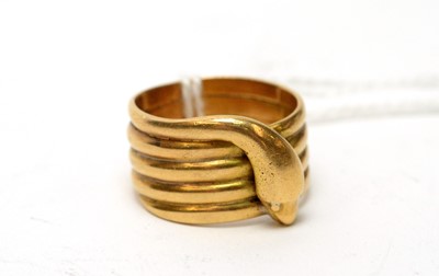 Lot 110 - An Edwardian 18ct gold coiled serpent ring