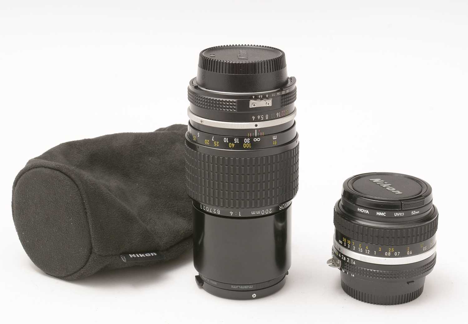 358 - Two Nikon lenses.