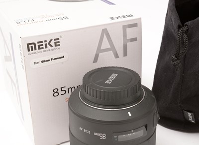 Lot 367 - A Meike lens.