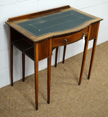 Lot 16 - An Edwardian inlaid mahogany desk.