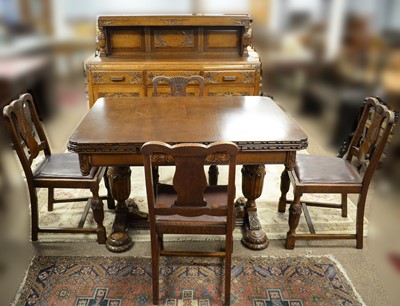 Lot 79 - Lees style mid 20th Century oak dining suite.