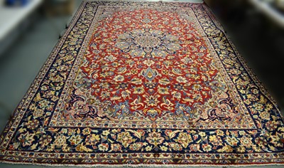 Lot 82 - A Kashan carpet.