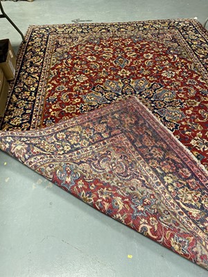 Lot 82 - A Kashan carpet.