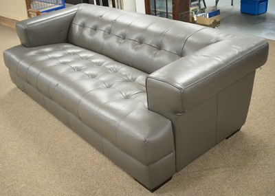 Lot 49 - Domicil grey leather three-seater settee.