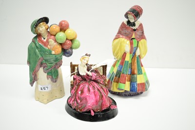 Lot 257 - Three Royal Doulton figures, various.