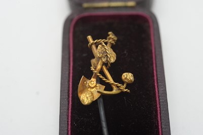 Lot 156 - An antique "gold rush" tie pin, and two bracelets