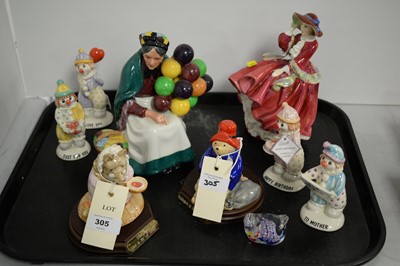 Lot 305 - Royal Doulton and other figures; and an Art glass paperweight.
