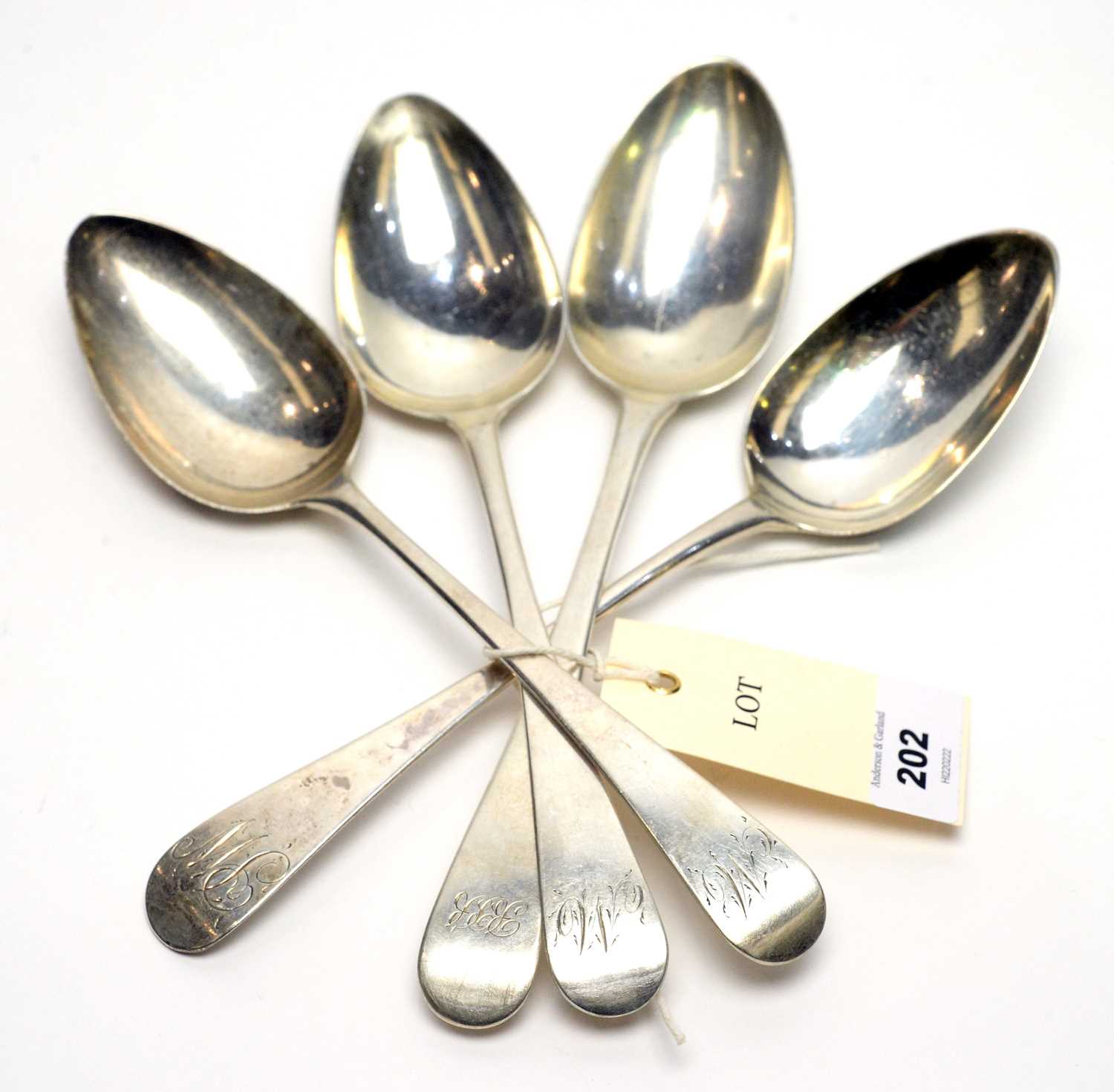 Lot 202 - Four Georgian silver table spoons