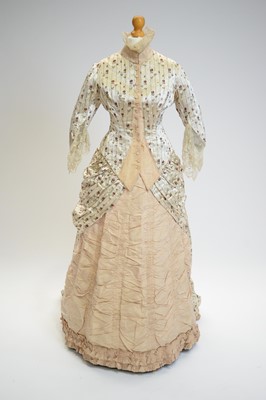 Lot 816 - An 1880s champagne silk two-piece day dress