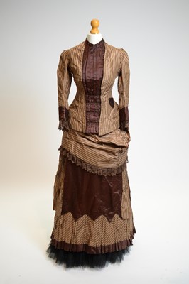 Lot 817 - A late 1880s silk two-piece walking dress