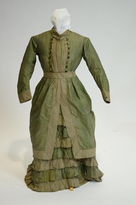 Lot 818 - An 1880's young girl's silk walking dress