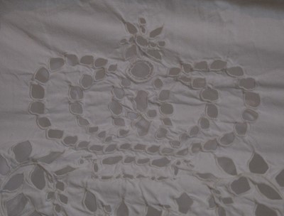 Lot 797 - An 1850s white cotton petticoat with crown motif