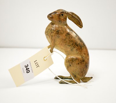 Lot 340 - A cold painted bronze figure of a hare.