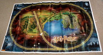 Lot 292 - Hornby 00 Gauge Harry Potter and The Philosopher's Stone Hogwarts Express Electric Train Set