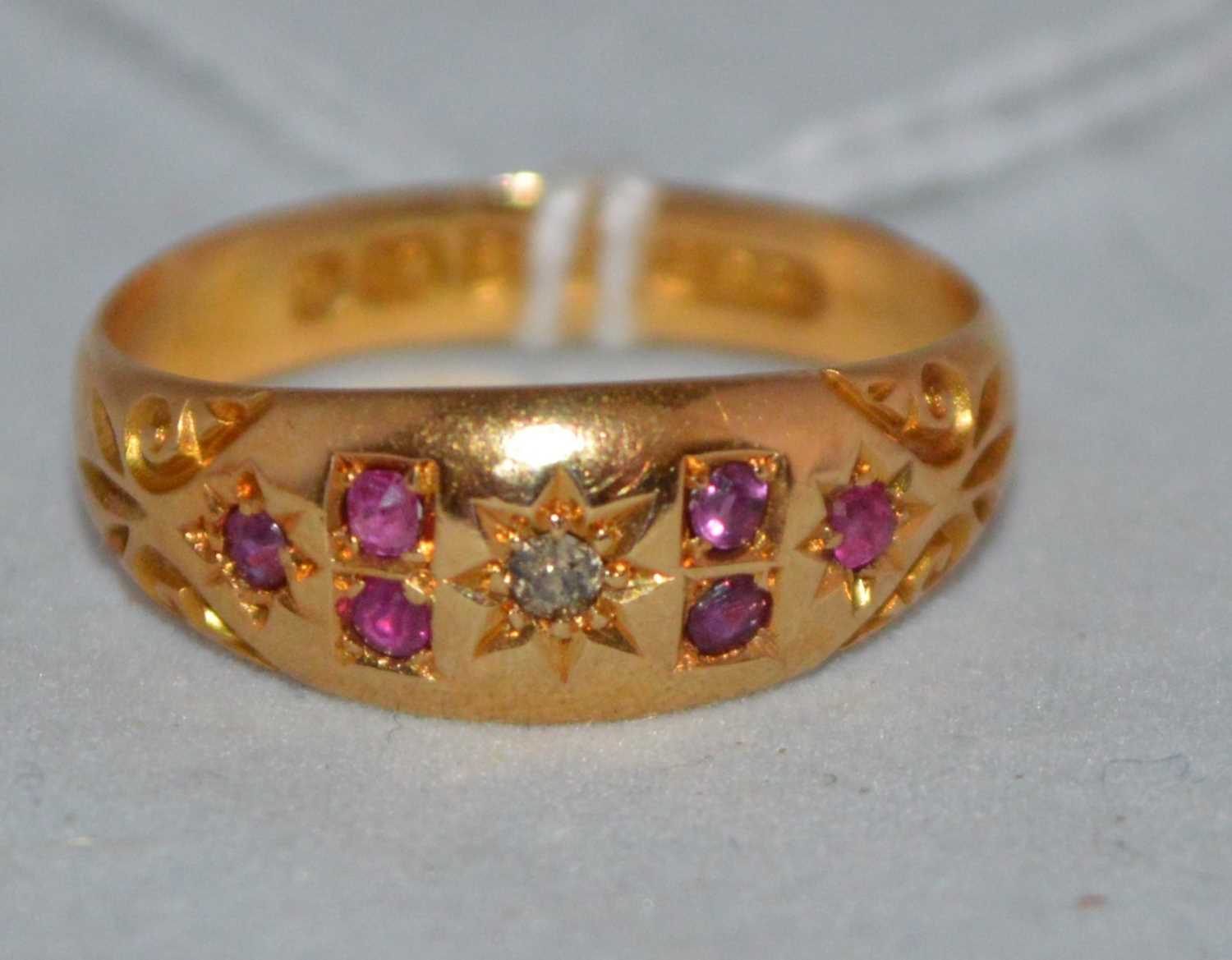 Lot 156 - A ruby and diamond ring