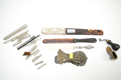 Lot 372 - A selection of letter openers and writing accessories.