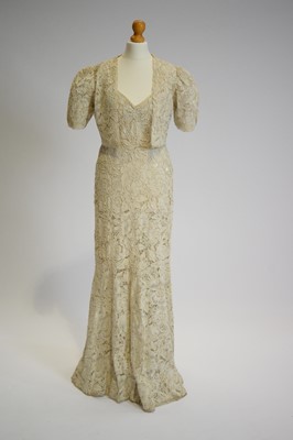 Lot 809 - A 1930s couched cord and cream lace two-piece evening gown