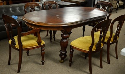 Lot 41 - Victorian-style extending dining table; and a set of six chairs.