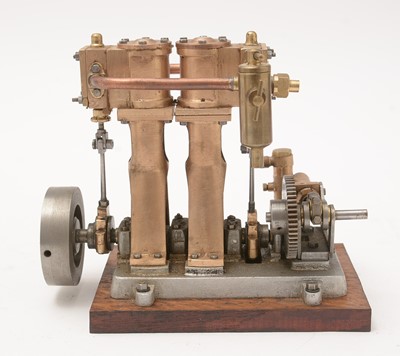 Lot 298 - A vertical two-cylinder live steam marine engine