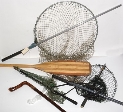 Lot 527 - Three landing nets, two walking sticks and a paddle