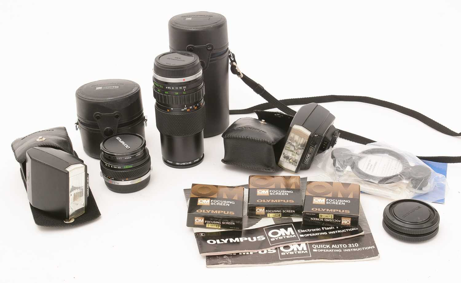 380 - Two Olympus Zuiko lenses and other accessories