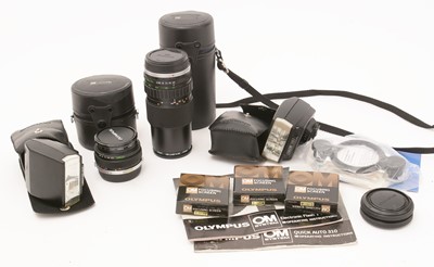 Lot 380 - Two Olympus Zuiko lenses and other accessories