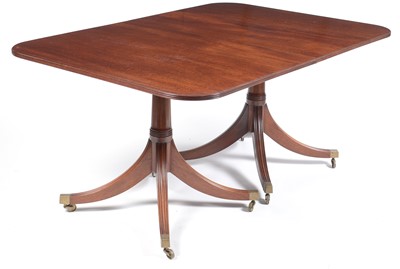 Lot 606 - George III style D-end twin pedestal dining table.