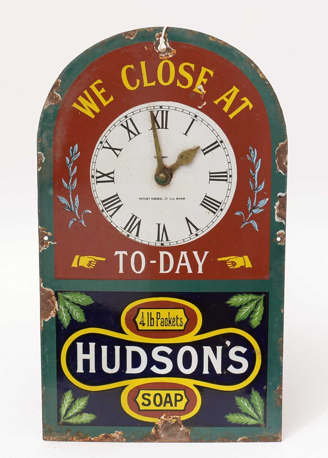 Lot 702 - Hudson's Soap clock faced enamel sign