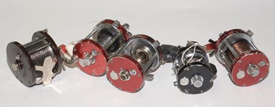 Lot 605 - Five fishing reels, makers Abu Sweden (x4) and Penn (1).