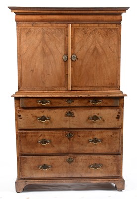 Lot 622 - An 18th Century walnut cabinet on associated chest