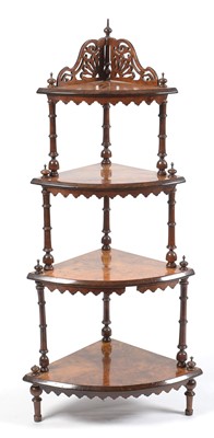 Lot 627 - A Victorian burr walnut graduated four tier what-not