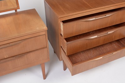 Lot 355 - Mid-Century teak chest of drawers and matching dressing chest.