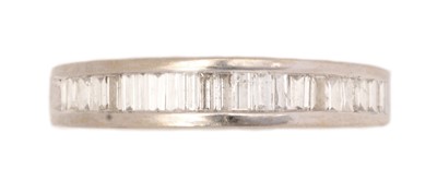 Lot 61 - A diamond half-hoop eternity ring