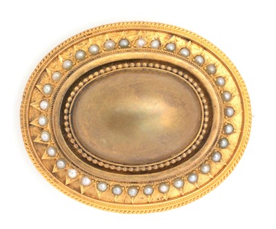 Lot 115 - A Victorian yellow metal and seed pearl mourning brooch