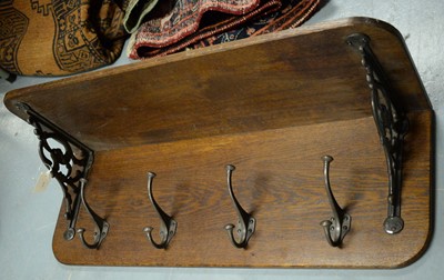 Lot 472 - A late19th/early 20th Century oak wall-mounted coat rack