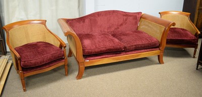 Lot 25 - Modern mahogany Bergere sofa and two armchairs.