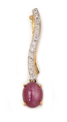 Lot 67 - A star-ruby and diamond pendant