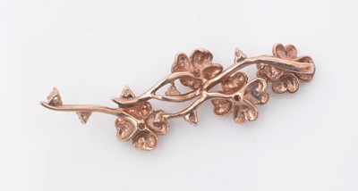 Lot 72 - A diamond and 9ct rose-gold pendant