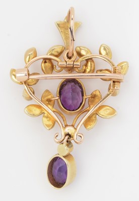 Lot 77 - An Edwardian amethyst and seed pearl pendant/brooch
