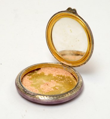 Lot 160 - A George V silver and purple enamel powder compact